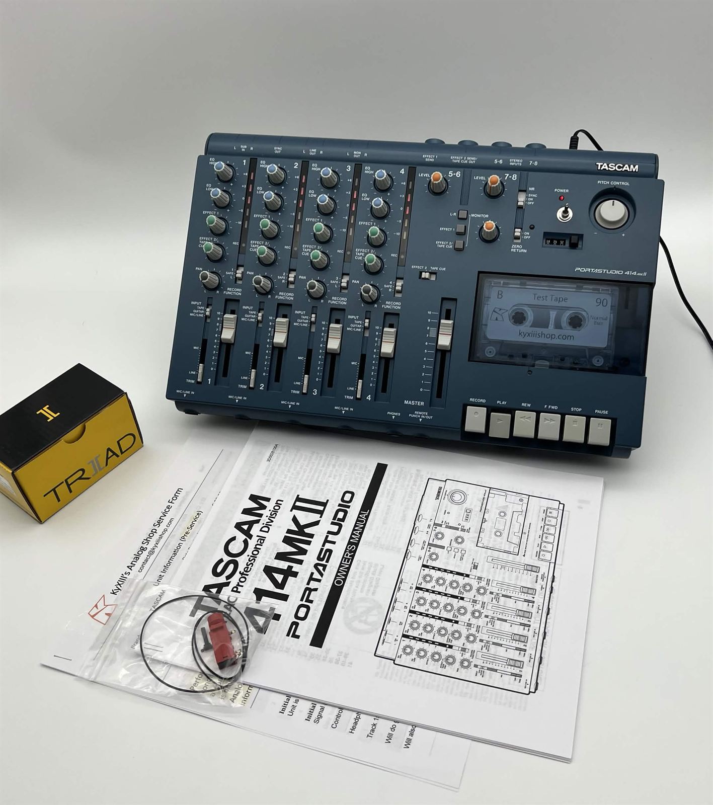Tascam Portastudio 414 MKII with owner's manual, spare belts and service form