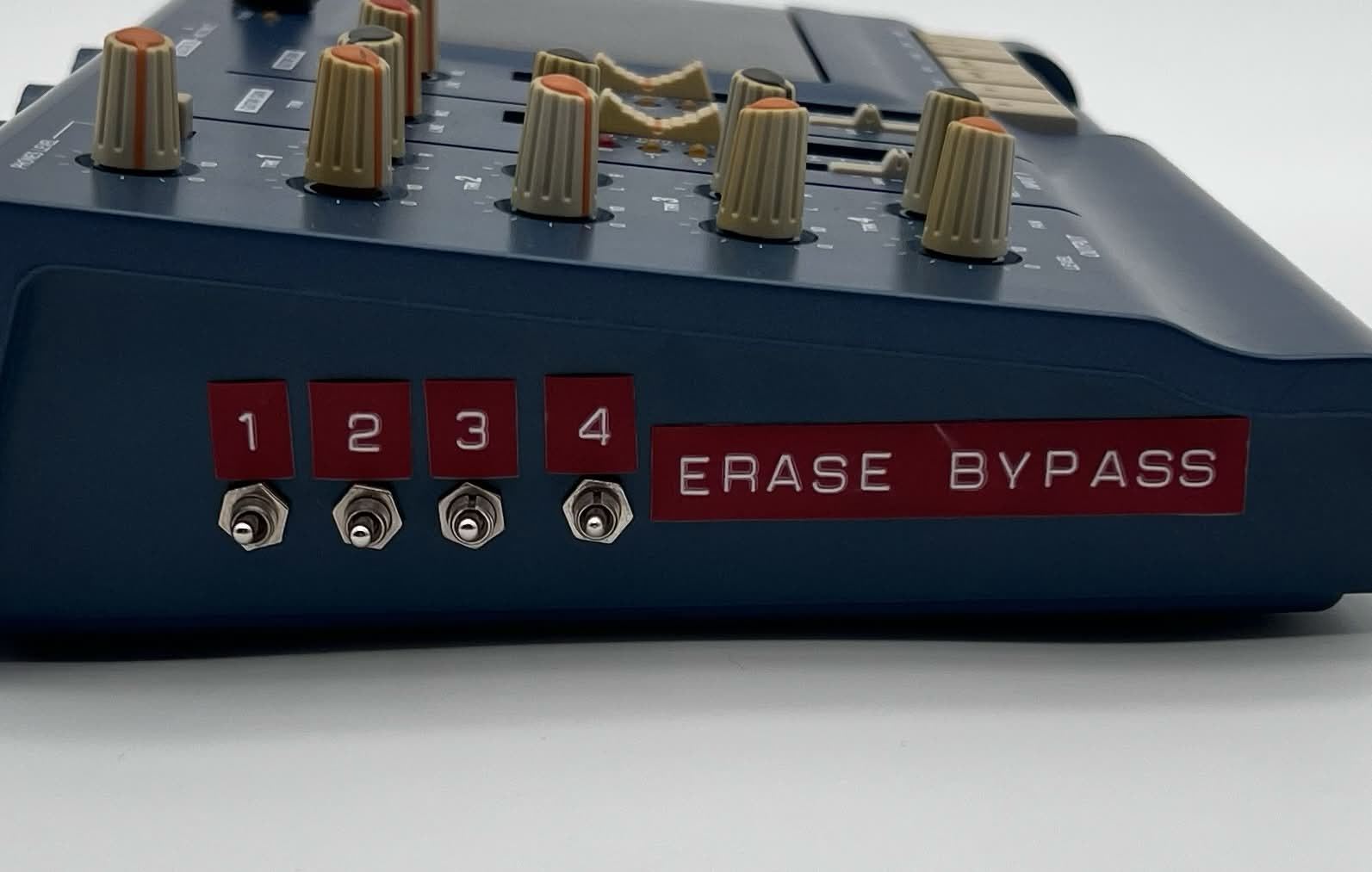 Four toggle switches labeled Erase Bypass 1 to 4